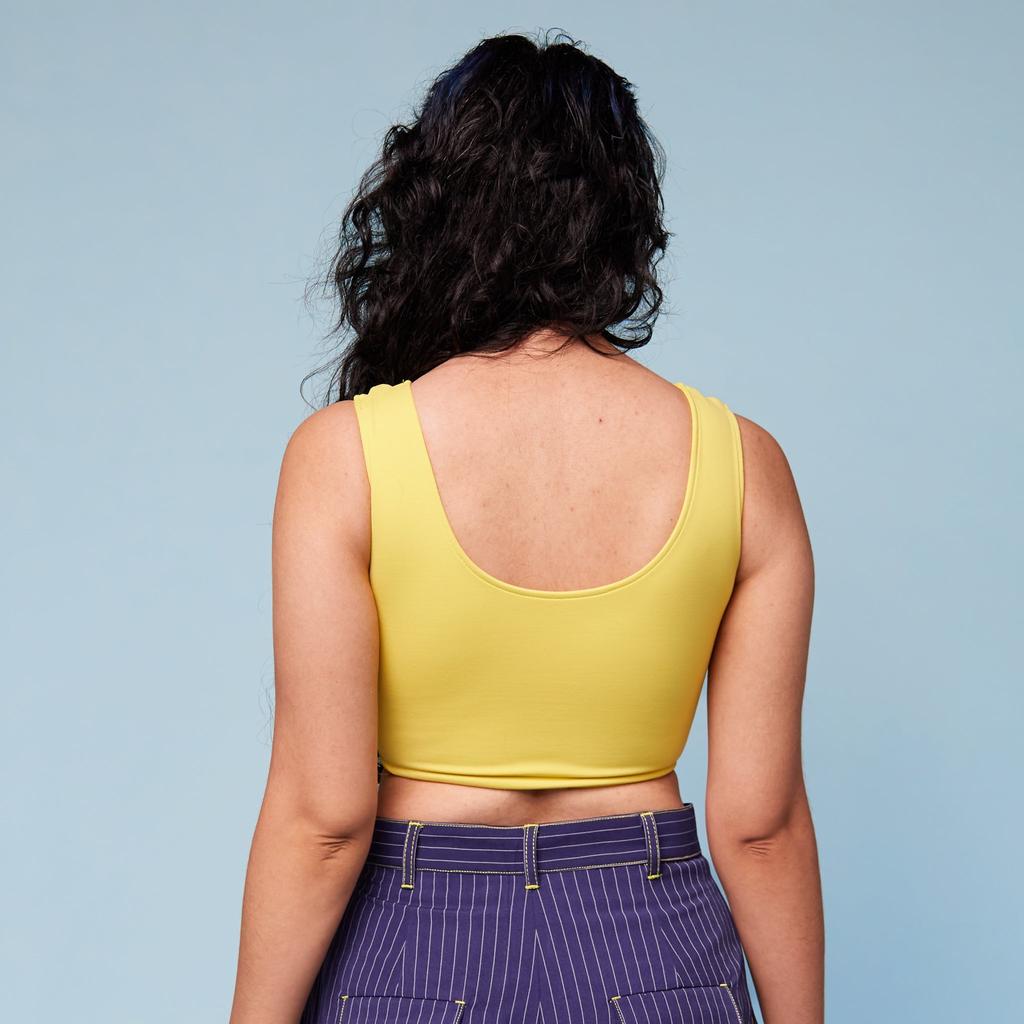 Model wearing Chest Binder Limoncello - back view