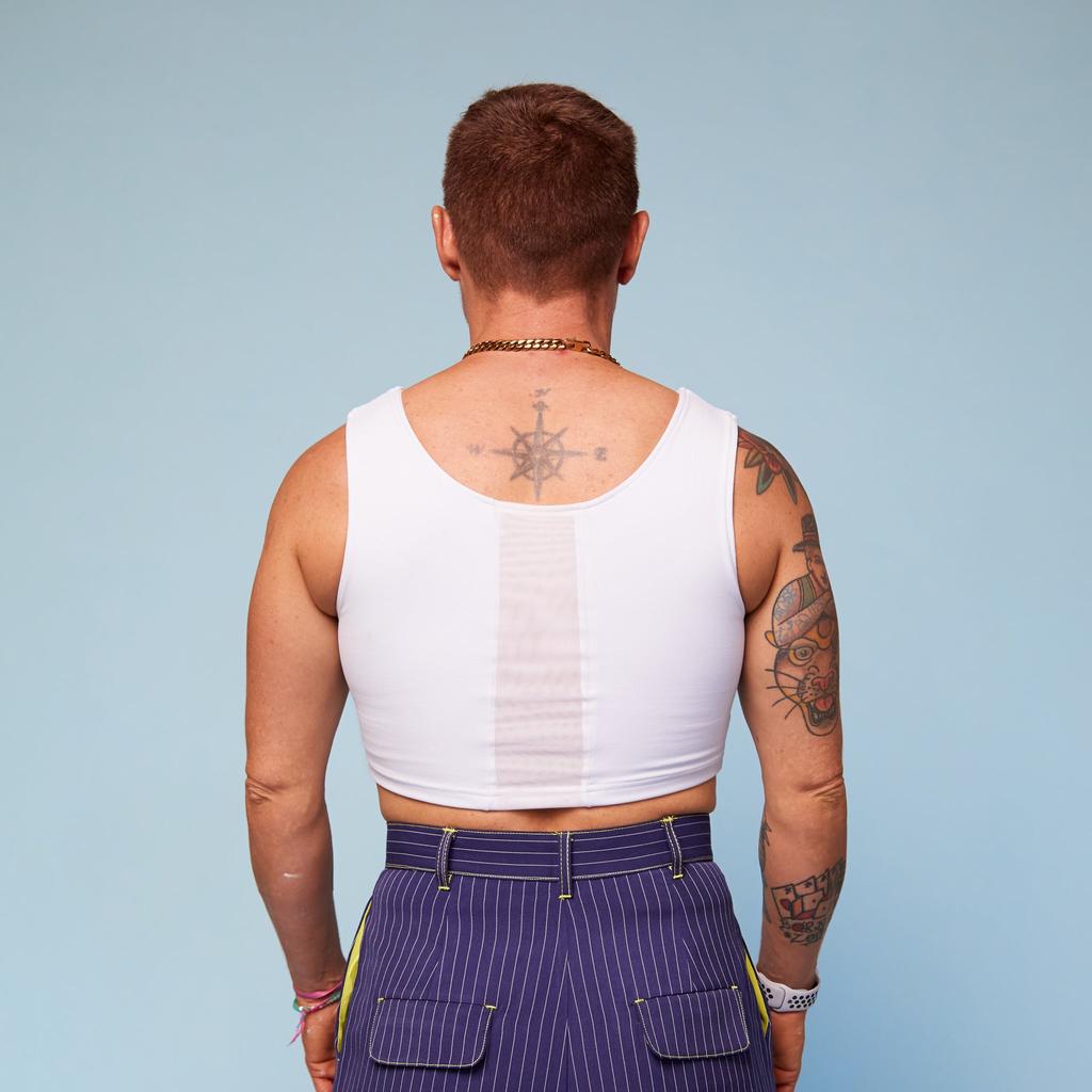 Model wearing Sensory Compression Vest Chest Binder - back view with breathable panel