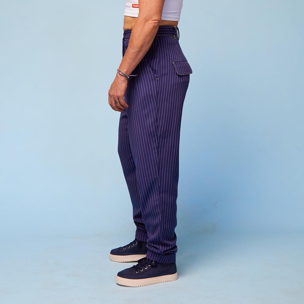 Model wearing Tripp Pants – side view -relaxed fit with a comfortable waistband for easy wear and movement.