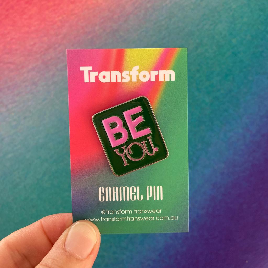 Image of a Pride Pin stating 'Be You'