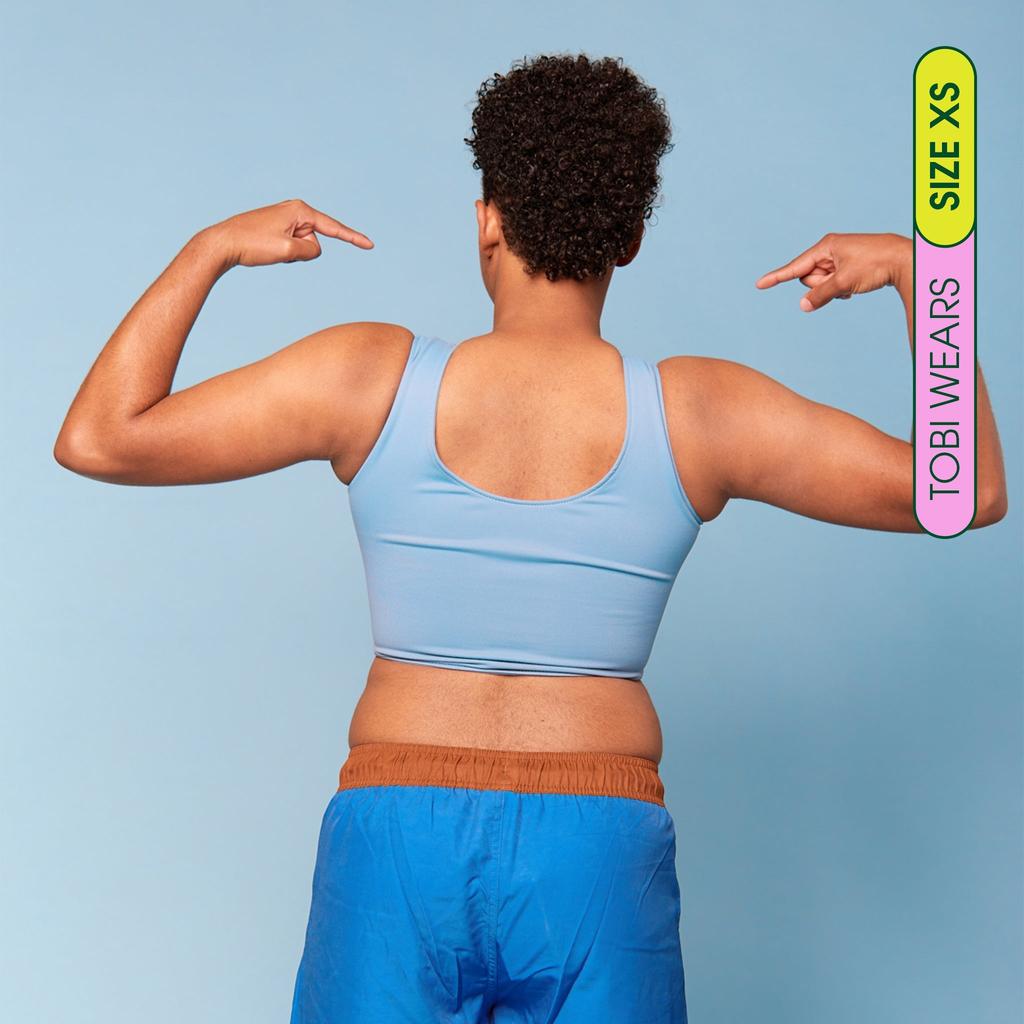 Tobi is wearing breathable Swim Binder  - back view