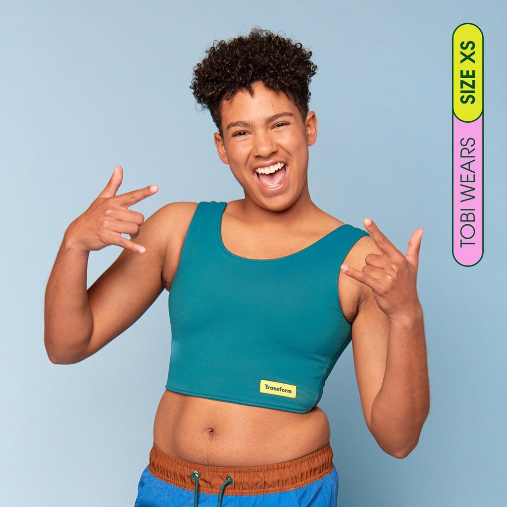 Tobi is wearing Swim Binder - Crop Moss Green - front view
