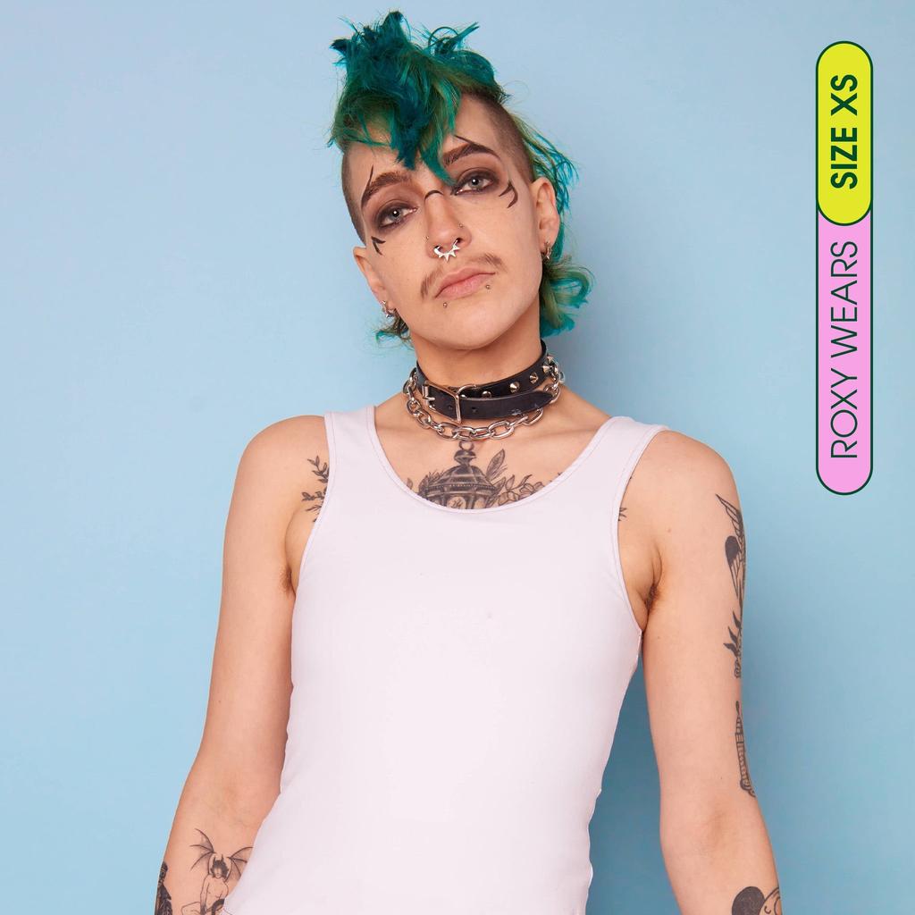 Roxy wearing white, breathable tank chest binder - front view