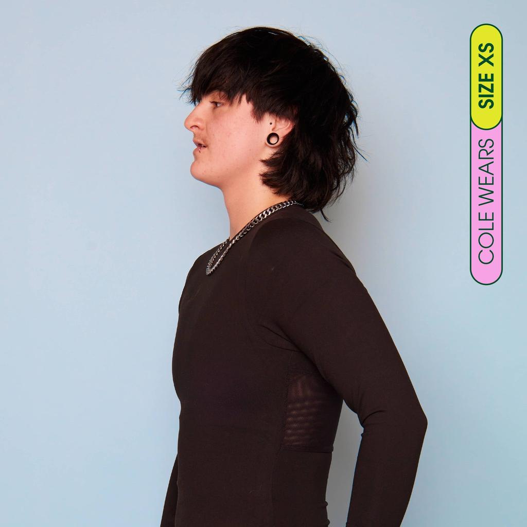 Cole wearing long sleeve compression shirt made from premium, breathable compression fabric - side view showing flattening effect