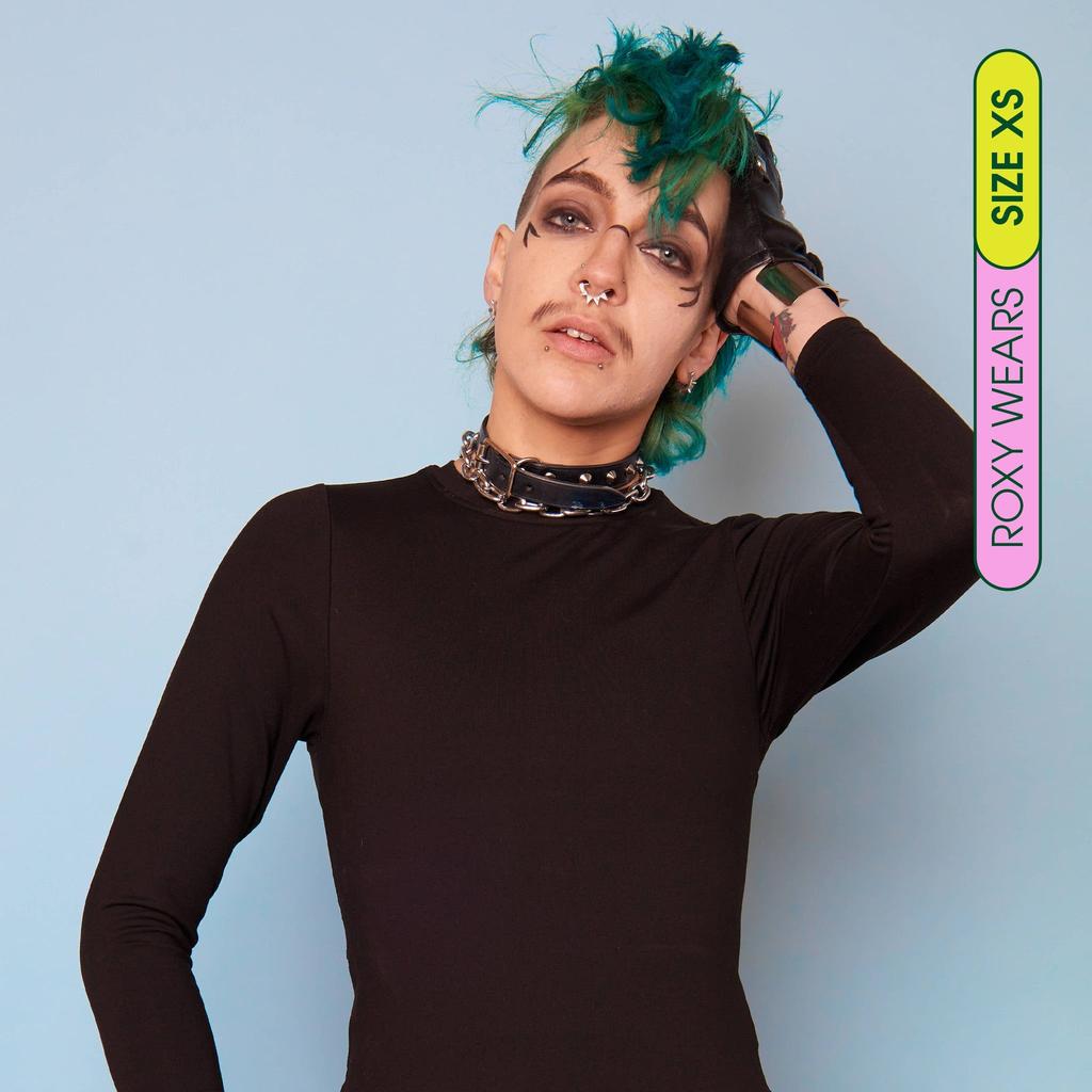 Roxy wearing long sleeve compression shirt made from premium, breathable compression fabric - front view