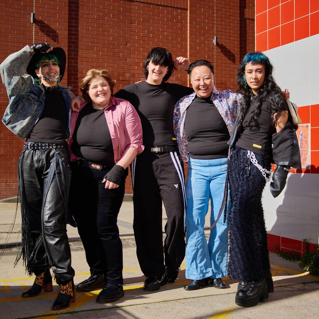 Models of all sizes all wearing compression t-shirts looking euphoric - Transform Transwear