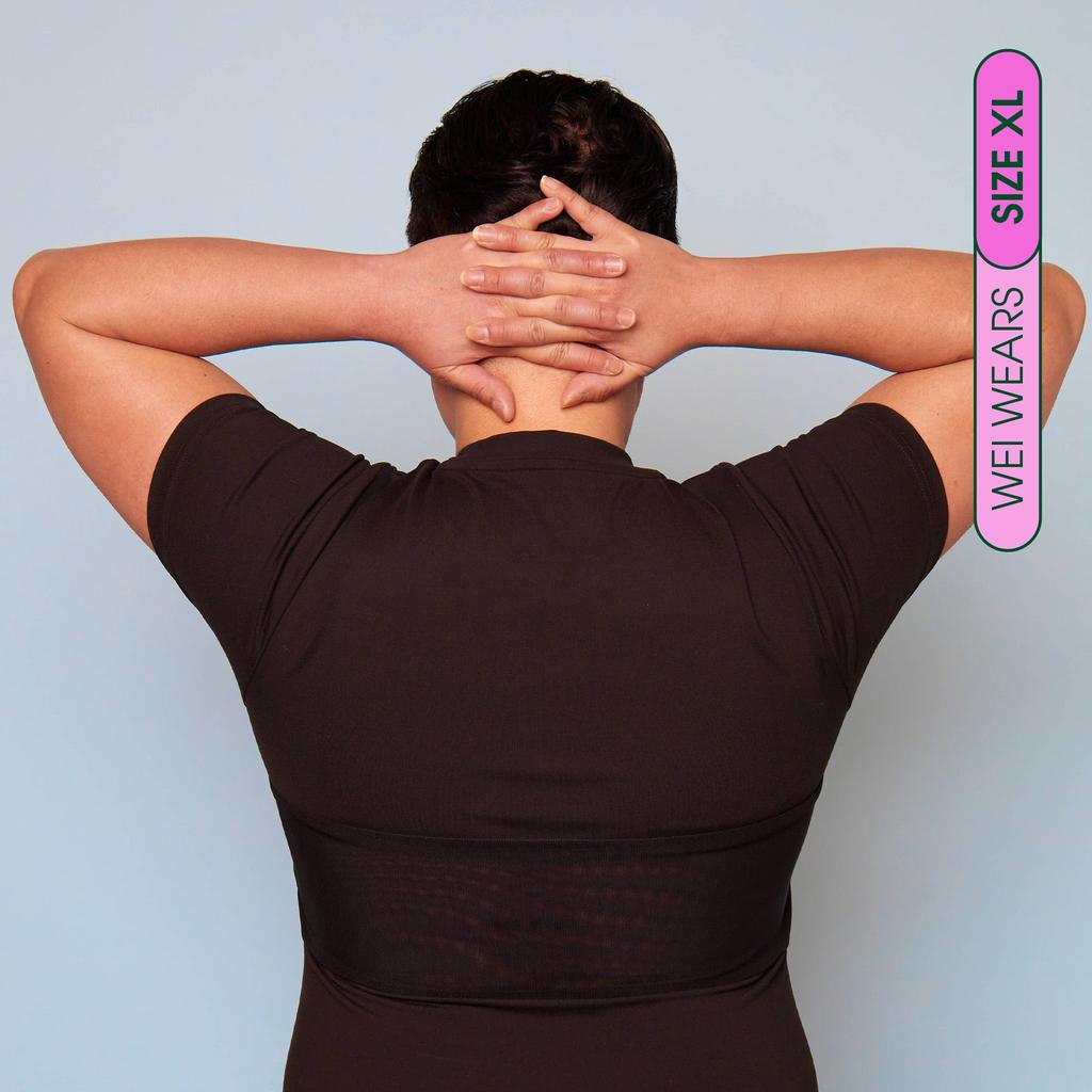 Wei wears size XL Compression Shirt - back view showing breathable panel